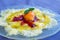 Delicious and refreshing dessert. Orange sorbet on pineapple carpaccio