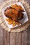 Delicious Roast duck with oranges on a plate. vertical top view