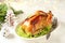 Delicious Roasted Chicken with Apple Slices. Christmas background.