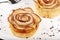 Delicious rose shaped puff pastry cakes with apples