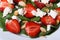 Delicious salad of fresh strawberries, spinach, goat cheese