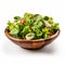 Delicious salad sitting in wooden bowl against neutral white background