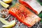 Delicious salted salmon with spices, lemon and dill