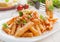 Delicious savory Italian penne rigate pasta