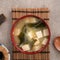 Delicious savory Japanese miso soup in a black bowl for eating