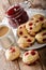 Delicious sconces biscuits with red currants are served with tea