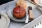 Delicious scones with Strawberry Jam,Clotted Cream and butter knife