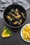Delicious seafood mussels with parsley sauce and lemon. Delicious steamed mussels