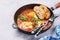 Delicious shakshuka breakfast in a pan