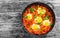 Delicious shakshuka - fried eggs, onion,bell peppers,tomatoes an