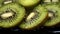 Delicious sliced kiwi close up with water drops