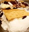 Delicious smore with giant roasting marshmallow and chocolate chips