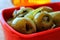 Delicious Spanish tapa. Olives with onion, oregano and olive oil