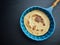 Delicious spelt pancake in a blue stoneware pan, too view