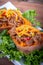 Delicious spicy pulled pork stuffed sweet potato dish