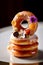 Delicious stacked donuts topped with maple glaze and decorated with flowers. Created with generative AI