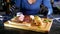 Delicious steak. A waiter in gloves cuts a juicy steak. Restaurant chef slicing medium rare beef steak.