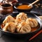 Delicious Steamed Dumplings With Peanut Butter Sauce - Stock Image