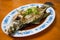 A delicious steamed sea bass