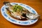 A delicious steamed sea bass