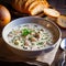 A delicious steaming bowl of creamy clam chowder.