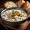 A delicious steaming bowl of creamy clam chowder.