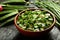 delicious stir fry okra served in clay bowl.