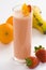 Delicious strawberry orange banana milkshake