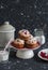 Delicious summer dessert - red currant muffins on a dark background.