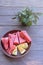 Delicious summer snack. Grilled salty Levantine halloumi cheese and slices of sweet watermelon on a wooden background.