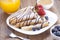 Delicious sweet French pancakes on a plate with fresh fruits