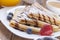 Delicious sweet French pancakes on a plate with fresh fruits