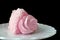 Delicious and sweet pink cake for Valentine or birthday. Home baking concept ready to eat, isolated on black background