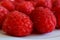 Delicious, sweet red raspberry. Juicy scarlet berries of fresh r