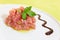 A delicious tartare of fresh Mediterranean tuna. Seasoned with extra virgin olive oil and parsley