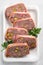 Delicious terrine with ground meat, ham and pistachios
