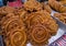Delicious Testy sweet fried jalebi showing for sale on a street food market in theDhaka-Bangladesh
