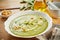 Delicious thick pea soup with flaked almonds