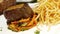 Delicious thick steak, salad and fries on meal dish