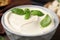 Delicious tofu sauce and basil leaves in bowl