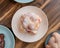 Delicious traditional mexican pan de muerto, filled with delicious cream, with red fruits inside, strawberries and blackberries