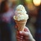 Delicious treat Vanilla ice cream held by a hand, tempting