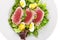 Delicious tuna steak with fresh green salad