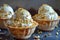 Delicious Vanilla Ice Cream Scoops with Crushed Nuts in Waffle Bowls on a Rustic Table Setting