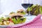 Delicious vegetarian burgers and potatoes. Lunch and wine. Light background and space for text . Copy space