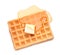 Delicious waffle with butter and honey on white background