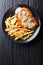 Delicious Wiener Hunter schnitzel with sauce and french fries cl