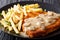 Delicious Wiener Hunter schnitzel with sauce and french fries cl