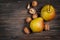 Delicious Williams pears and walnuts on a rustic wooden table