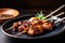 Delicious yakitori skewers with charred edges and succulent chicken meat, served on a traditional Japanese plate